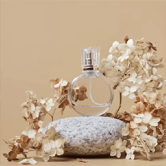 Perfume bottle on stone