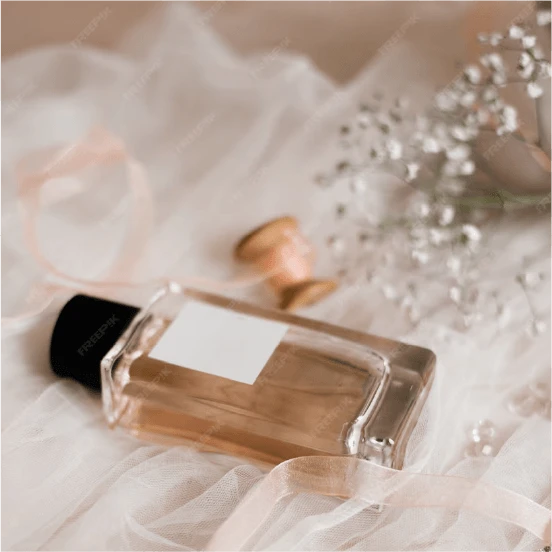 Perfume bottle on fabric